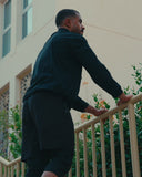 Man wearing the M-Flex Track Jacket outdoors
