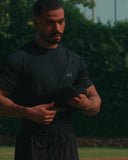Man wearing the M-Flex Awrah Set — training top and awrah shorts together