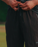 High-rise adjustable drawstring waist on the Awrah shorts